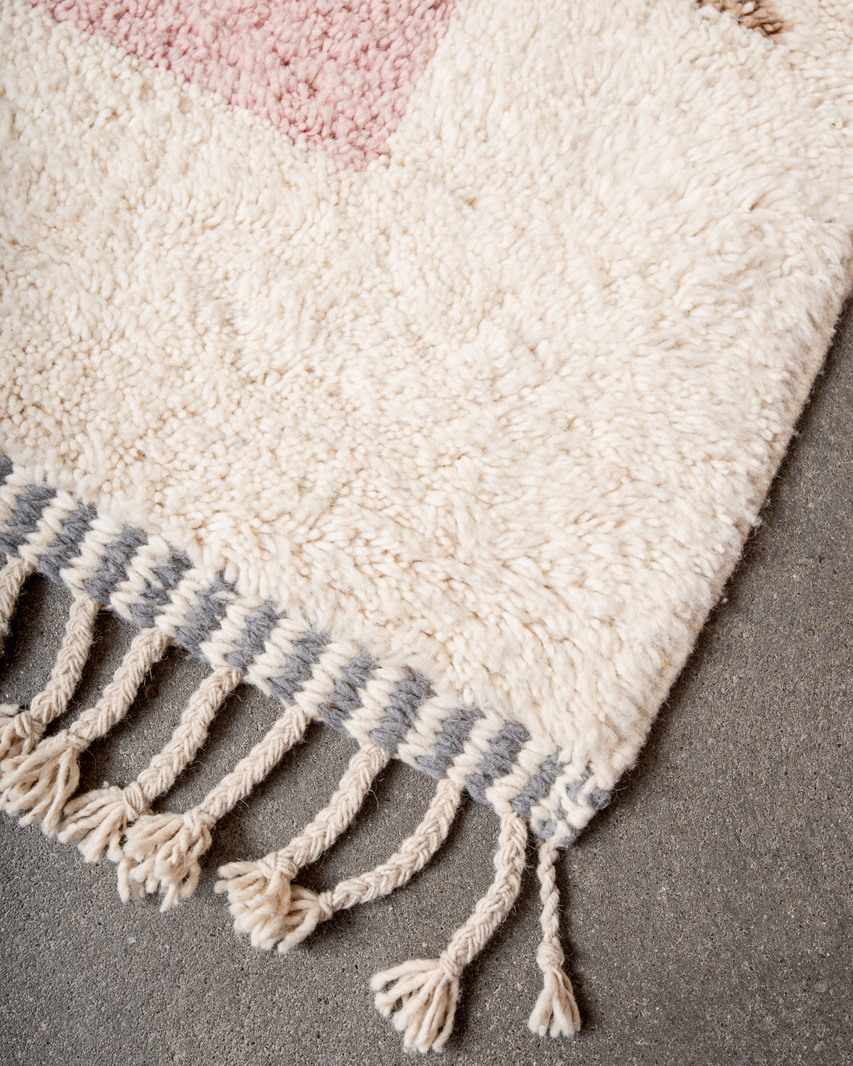 Modern, designer, handcrafted Berber rug from Morocco. Beniourain carpet with beautiful colours and patterns and fluffy wool texture.